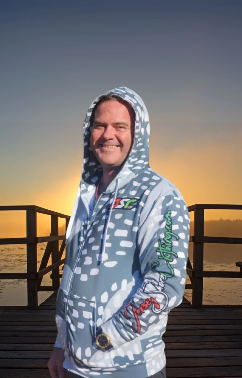 A man wearing a hoodie with dots on it.