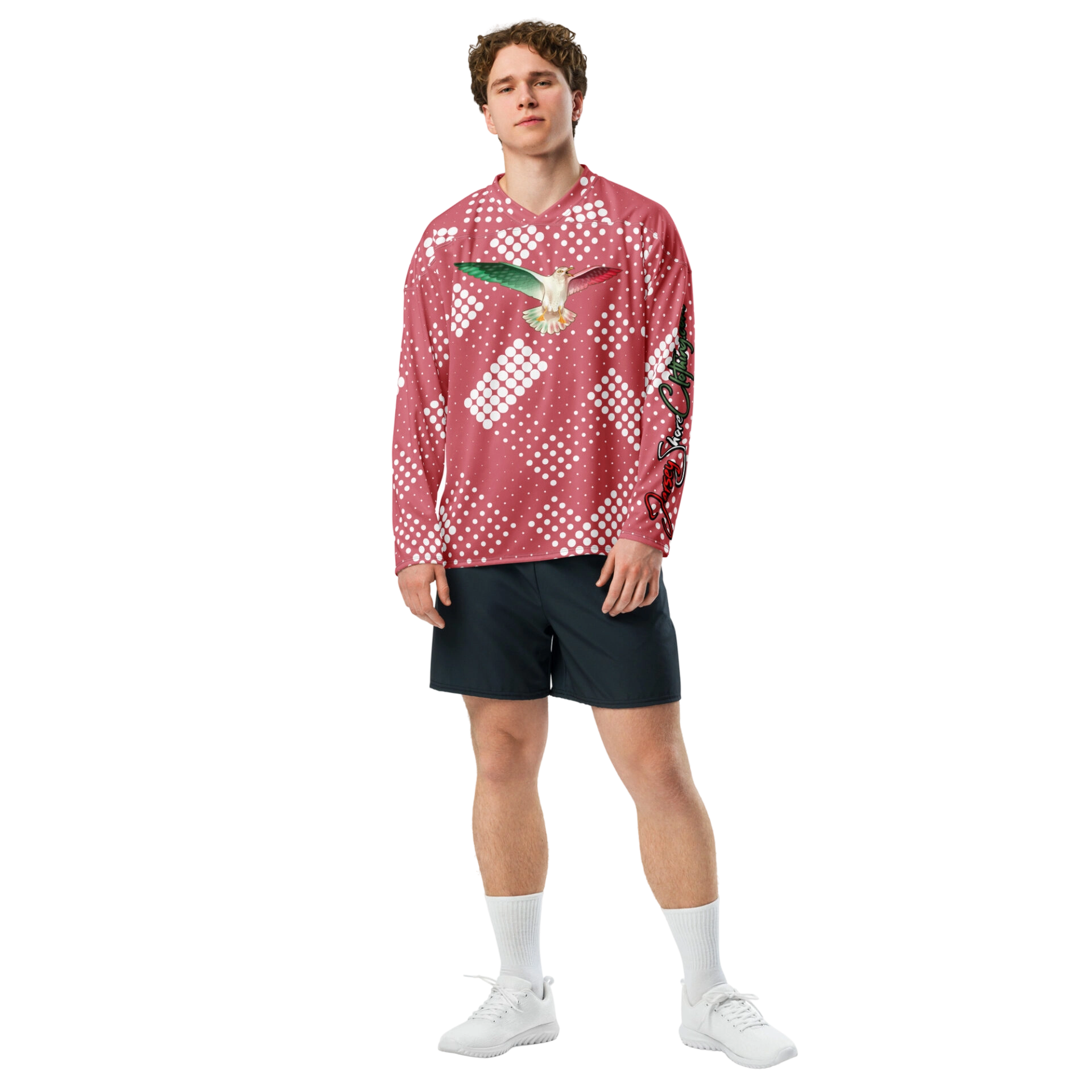 Man wearing pink bird-print patterned shirt