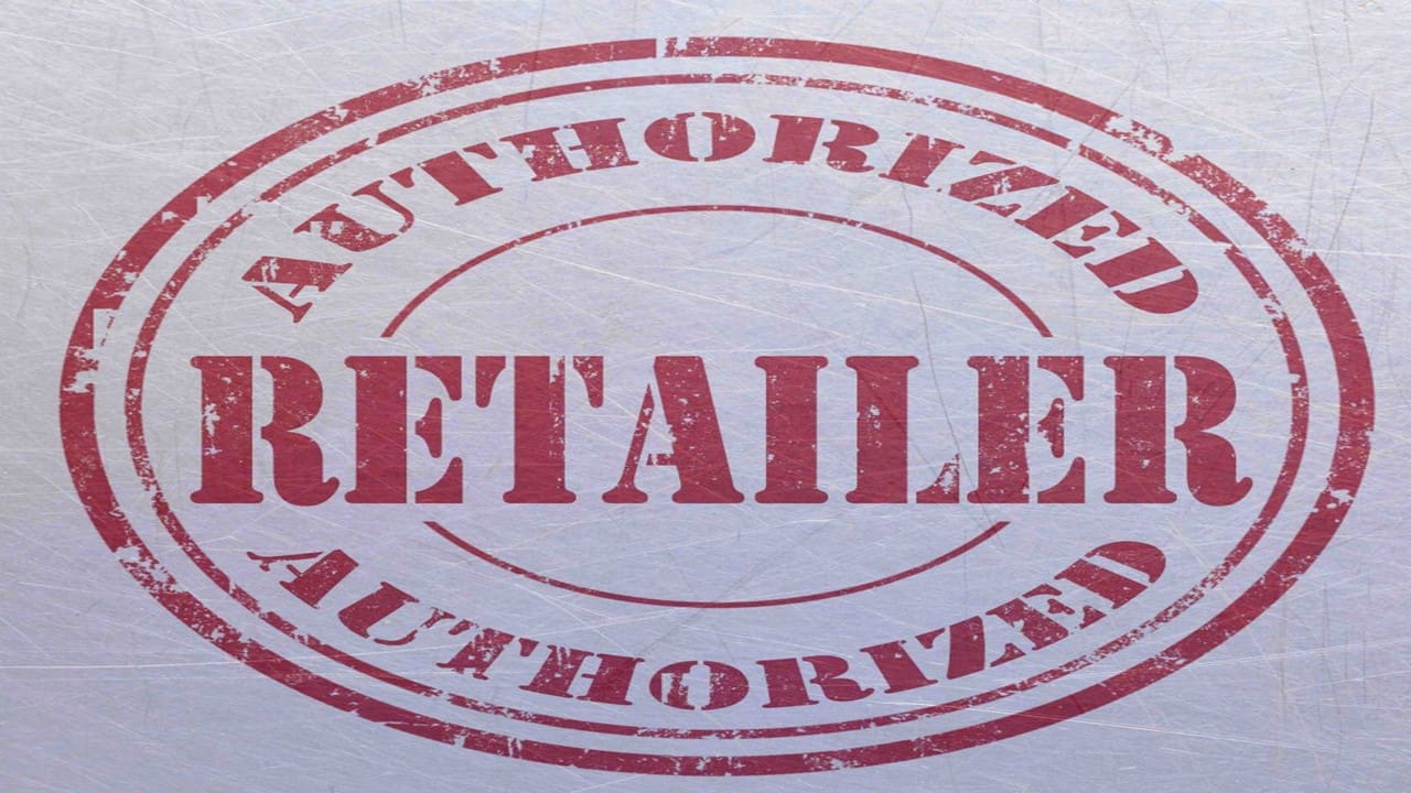 Red oval authorized retailer stamped seal